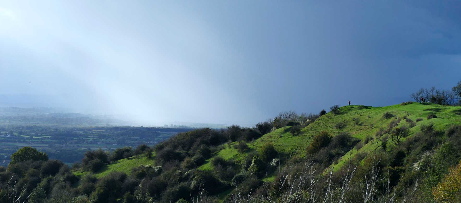 Photo of Haresfield Beacon on a stormy day
